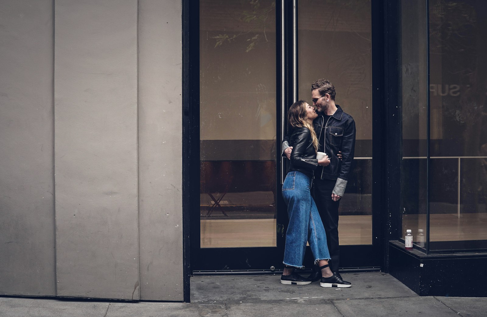 Two people sharing a quiet moment while navigating an unspoken connection