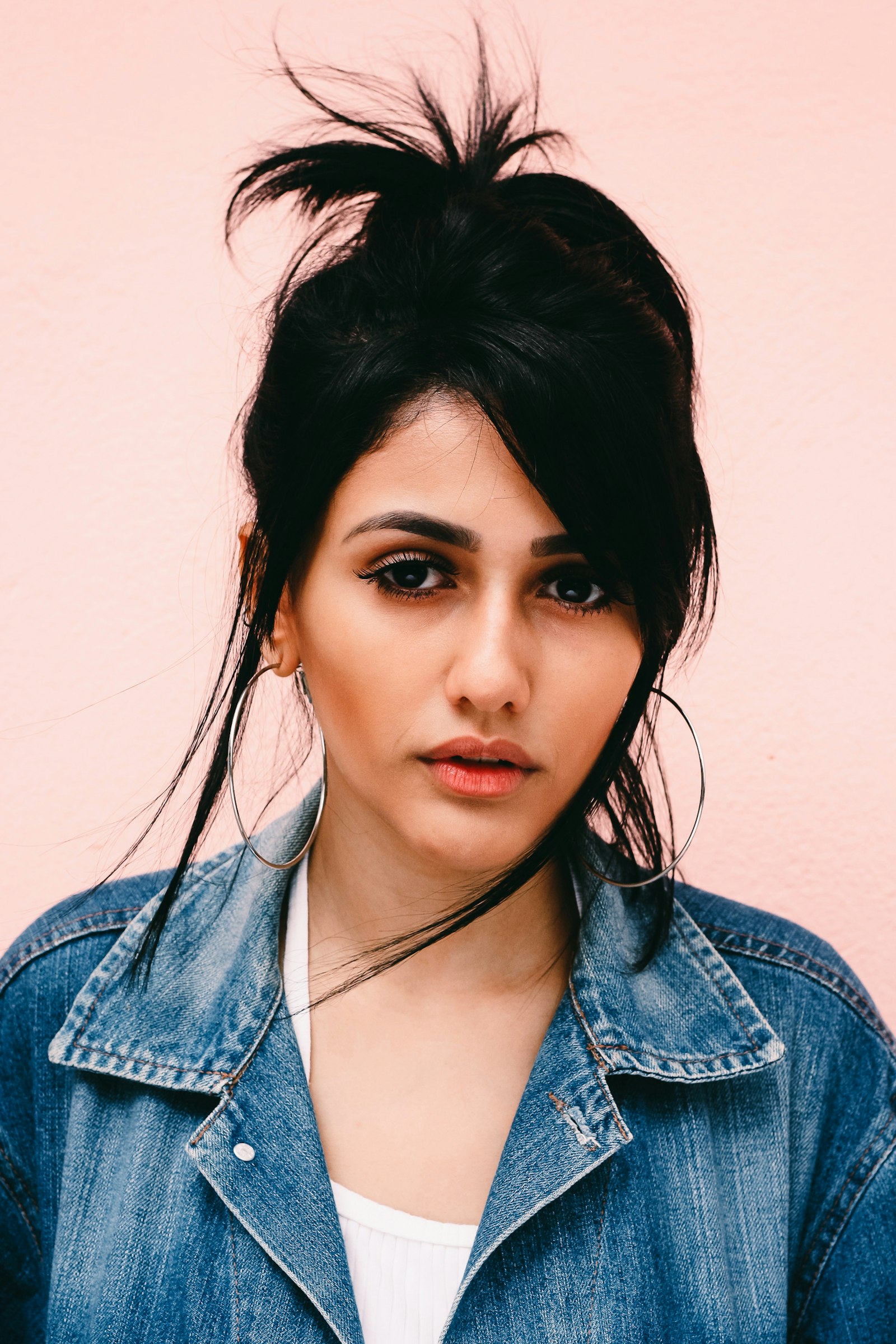 Confident woman standing calmly in warm natural light